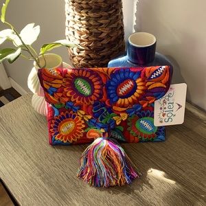 8’’W x 10’’H clutch purchased from Etsy never worn